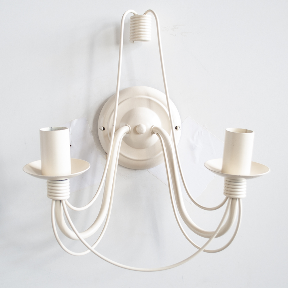 Cream candle wall lights